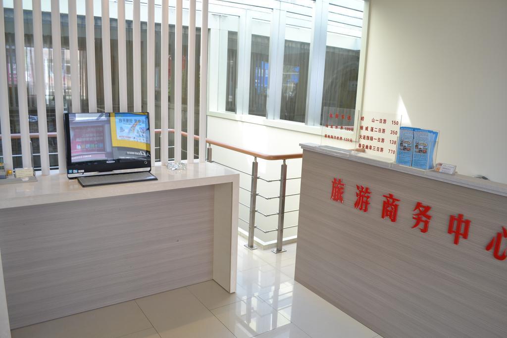 Qingdao Renjia Bussiness Hotel Стая снимка
