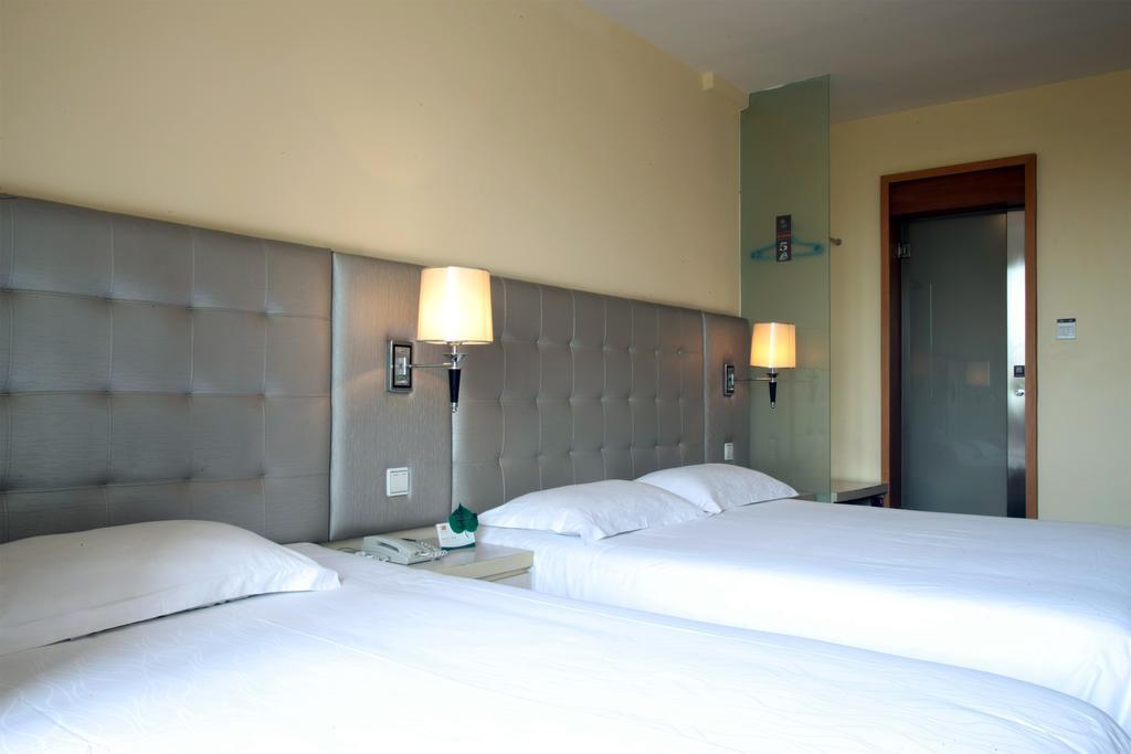 Qingdao Renjia Bussiness Hotel Екстериор снимка