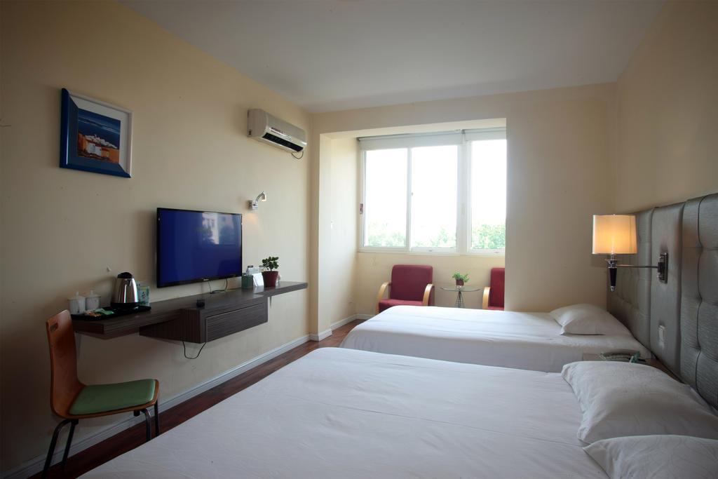 Qingdao Renjia Bussiness Hotel Екстериор снимка